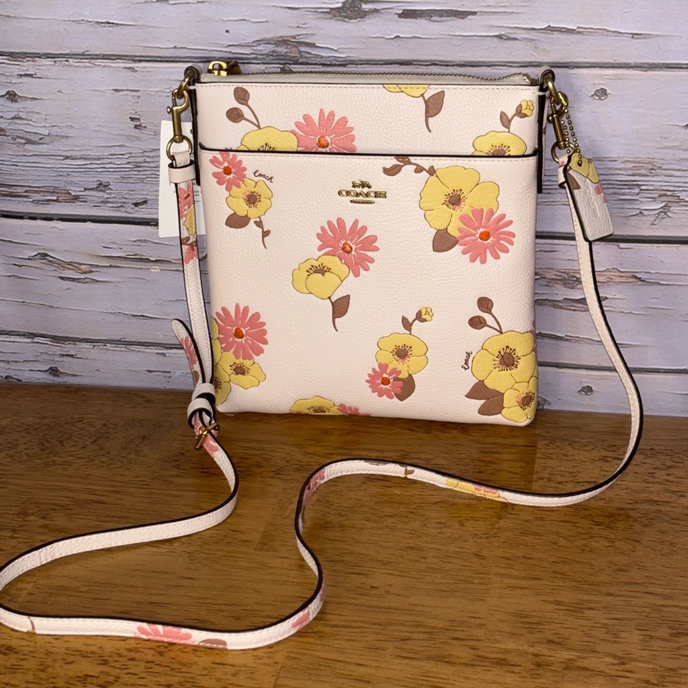 Coach Kitt floral messenger crossbody bag.